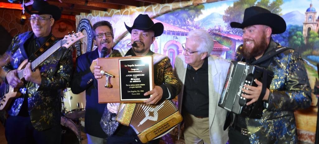 Presentación en vivo de Grupo Poder